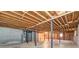Clean unfinished basement with exposed beams and concrete floor, ready to be transformed into a living space at 2811 Bay Leaf Se Dr, Conyers, GA 30094