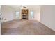 Bright living room with a stone fireplace adding a touch of rustic elegance to the space at 2811 Bay Leaf Se Dr, Conyers, GA 30094