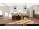 Bright kitchen island featuring modern pendant lighting and stylish bar stools at 6206 Cedarcrest Nw Rd, Acworth, GA 30101