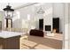 Spacious living room featuring high ceilings, hardwood floors, and abundant natural light at 6206 Cedarcrest Nw Rd, Acworth, GA 30101