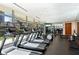 Bright gym featuring cardio machines and large windows with city views at 700 Park Regency Ne Pl # 603, Atlanta, GA 30326