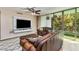 Bright living room with a large TV and a window offering nice outdoor views at 700 Park Regency Ne Pl # 603, Atlanta, GA 30326