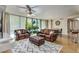 Spacious living room filled with natural light from the large windows at 700 Park Regency Ne Pl # 603, Atlanta, GA 30326