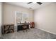 Spare bedroom is illuminated by natural light with a piano and music stand at 3735 Holiday Lane Ln, Atlanta, GA 30349