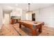 Spacious game room with a full-sized pool table and a kitchenette that provides space to entertain guests at 3735 Holiday Lane Ln, Atlanta, GA 30349