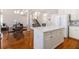 Spacious kitchen island with stainless appliances, open to the dining area and living space at 3735 Holiday Lane Ln, Atlanta, GA 30349