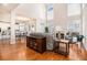 Spacious living room with hardwood floors, a fireplace and large windows with natural light at 3735 Holiday Lane Ln, Atlanta, GA 30349