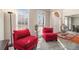 Cozy sitting area with bright windows, neutral walls and comfortable furniture at 3735 Holiday Lane Ln, Atlanta, GA 30349
