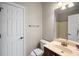 Cozy bathroom featuring neutral paint, standard vanity, and updated fixtures at 1502 Park Hollow Ln, Lawrenceville, GA 30043