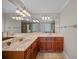 Light-filled bathroom with double vanity, updated fixtures, and tile flooring at 1502 Park Hollow Ln, Lawrenceville, GA 30043