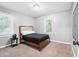 Bedroom featuring a large window for natural light with neutral decor at 2150 Meadowlane Dr, Atlanta, GA 30311