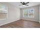 Bright bedroom featuring two windows and hardwood floors at 2478 Graywall St, Atlanta, GA 30344