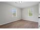 Simple bedroom with wood-look floors and abundant natural light at 2478 Graywall St, Atlanta, GA 30344