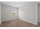 A bedroom featuring hardwood floors, neutral paint and natural light from window at 2478 Graywall St, Atlanta, GA 30344