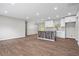 Modern kitchen with white cabinets, granite countertops, and a rustic island at 2478 Graywall St, Atlanta, GA 30344
