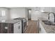 Newly renovated kitchen with stainless steel appliances, granite countertops, and modern fixtures at 2478 Graywall St, Atlanta, GA 30344