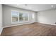 Spacious living room showcasing neutral paint, hardwood floors, and ample natural light at 2478 Graywall St, Atlanta, GA 30344