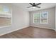 Bedroom with natural light, a ceiling fan, and laminate flooring at 2478 Graywall St, East Point, GA 30344