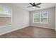 Spacious bedroom featuring hardwood floors and large windows for natural light at 2478 Graywall St, East Point, GA 30344