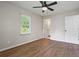 Well-lit bedroom with hardwood floors and a ceiling fan at 2478 Graywall St, East Point, GA 30344