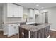 Modern kitchen featuring white cabinets, granite countertops, stainless steel appliances at 2478 Graywall St, East Point, GA 30344
