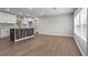 Spacious living area with new flooring, bright windows, and modern neutral paint at 2478 Graywall St, East Point, GA 30344