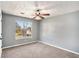 Neutral bedroom with carpet floors, a large window, and ample space at 2733 Cedar Tree Ln, Ellenwood, GA 30294