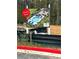 Community billboard showing a rendering of the Wildwood Place Pool and Cabana at 4517 Twinberry Dr, Powder Springs, GA 30127