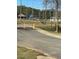 Scenic walking path with shade trees and playground views at 4517 Twinberry Dr, Powder Springs, GA 30127