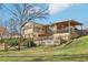 Spacious backyard showcasing the multi-level deck and a well-maintained lawn at 767 Smithstone Se Rd, Marietta, GA 30067