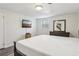 Bedroom with modern flooring, flat screen TV, and natural light at 767 Smithstone Se Rd, Marietta, GA 30067