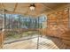 Cozy covered wooden deck featuring a ceiling fan and views of the backyard at 767 Smithstone Se Rd, Marietta, GA 30067