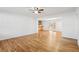 Spacious living room featuring gleaming hardwood floors, neutral walls, and modern lighting at 767 Smithstone Se Rd, Marietta, GA 30067