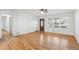 Bright and airy living room with hardwood floors and a large window at 767 Smithstone Se Rd, Marietta, GA 30067