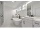 Bright bathroom with double vanity, soaking tub, and clean design at , Dunwoody, GA 30338