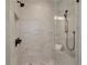 Luxurious walk-in shower with sleek fixtures and tile walls at , Dunwoody, GA 30338