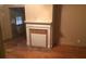 Cozy room featuring a decorative fireplace and hardwood floors providing a comfortable space at 1840 Madrona Nw St, Atlanta, GA 30318