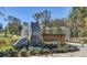 Inviting entrance to Westside Park with natural stone and decorative architectural elements at 1840 Madrona Nw St, Atlanta, GA 30318