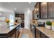 Modern kitchen featuring stainless steel appliances, granite countertops, and ample cabinet space at 1848 Laurel Green Way, Atlanta, GA 30344