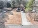 Property featuring a long driveway and detached shed at 2577 Twin Oaks Sw Dr, Marietta, GA 30064