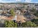 Neighborhood view of a home with mature trees in a suburban setting at 2577 Twin Oaks Sw Dr, Marietta, GA 30064