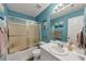 Bathroom with a shower and a single sink vanity at 2577 Twin Oaks Sw Dr, Marietta, GA 30064