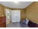 Neutral bedroom with a daybed and large closet perfect for an office at 2577 Twin Oaks Sw Dr, Marietta, GA 30064