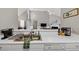 Open concept featuring a kitchen with white counters and sink at 2577 Twin Oaks Sw Dr, Marietta, GA 30064