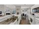 Bright open concept featuring a kitchen, dining area, and living area at 2577 Twin Oaks Sw Dr, Marietta, GA 30064