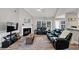 The living room features hardwood floors, a fireplace, and a comfortable seating area at 2577 Twin Oaks Sw Dr, Marietta, GA 30064