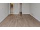 Bedroom showcases modern flooring, neutral walls, and a view into the bathroom at 2223 Wingate Sw St, Atlanta, GA 30310