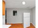 This kitchen area is equipped with a white refrigerator and a window for natural lighting at 2223 Wingate Sw St, Atlanta, GA 30310