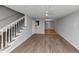 Spacious living room showcasing new floors and natural light, flowing into the dining area at 2223 Wingate Sw St, Atlanta, GA 30310