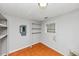 A versatile room space showcasing neutral walls and shelving units by a window at 2223 Wingate Sw St, Atlanta, GA 30310